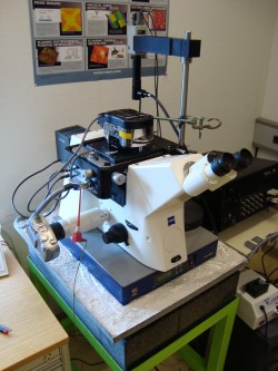 MFP3D AFM setup with vibrational isolation and optical microscope